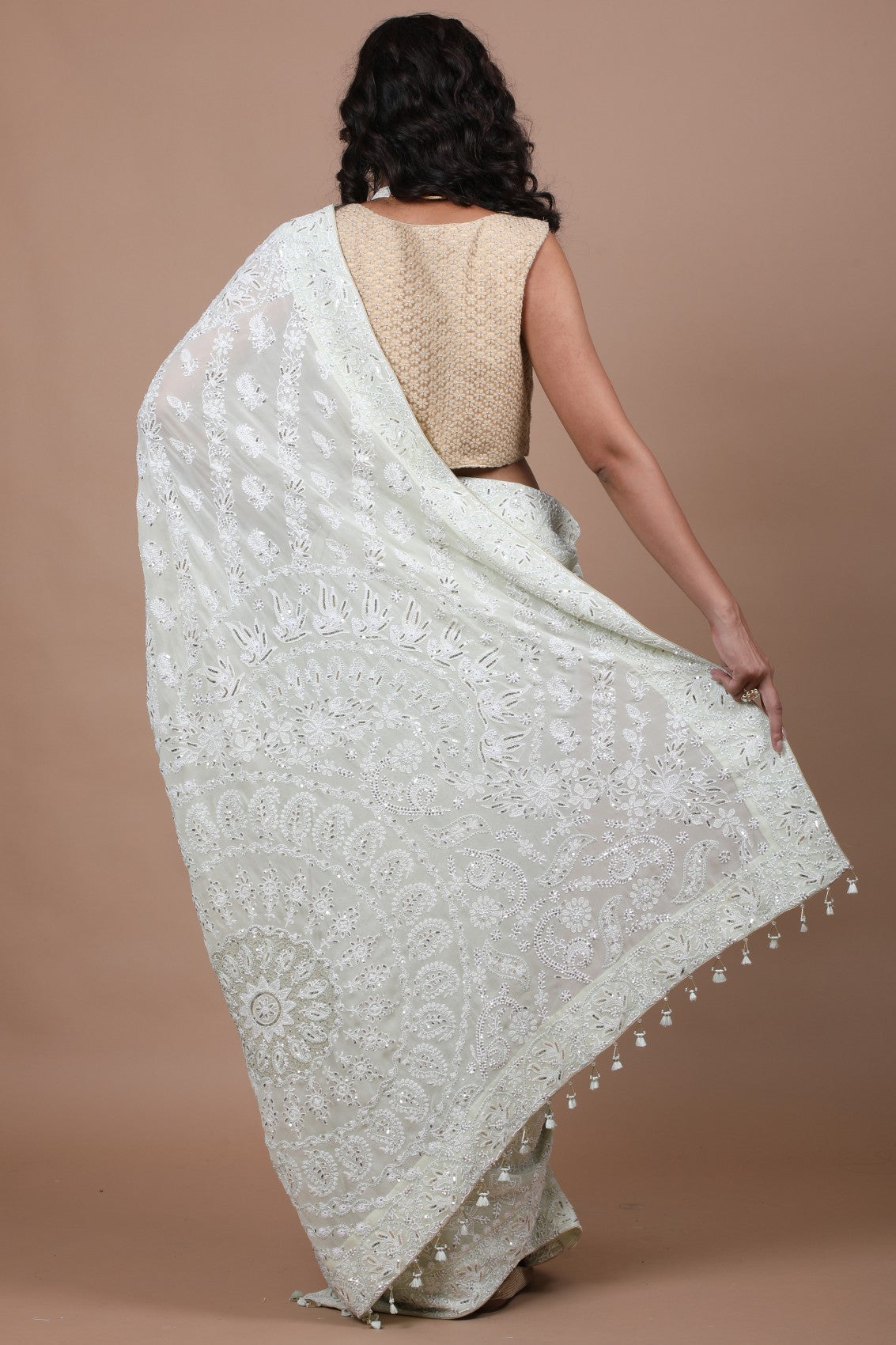 Elegant Pista Green Chikankari Georgette Saree with Traditional Embroidery & Embellishments