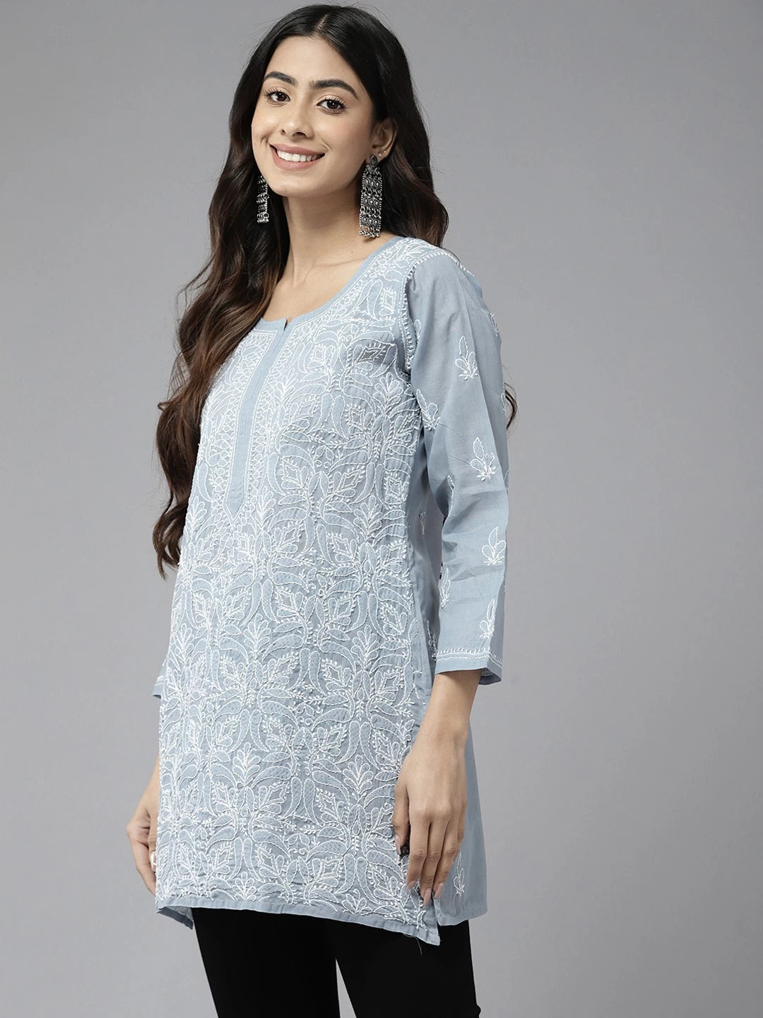 Vibrant Peach Cotton Kurti with Intricate Chikankari