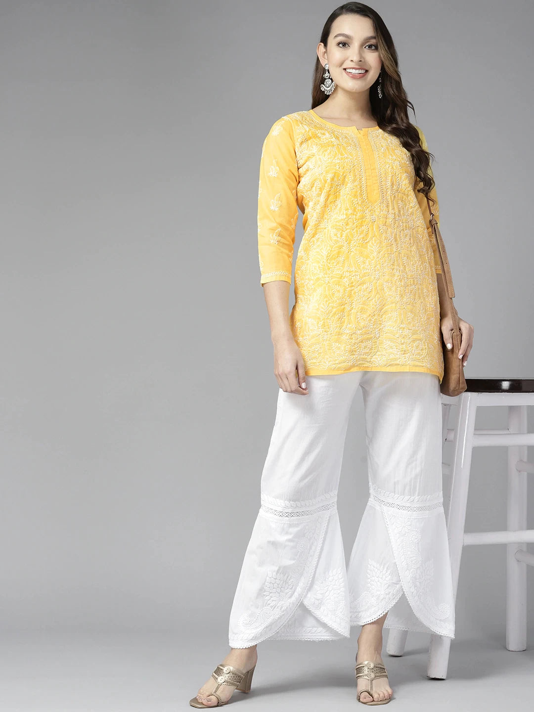 Vibrant Peach Cotton Kurti with Intricate Chikankari