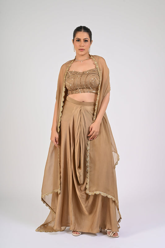 Dull Gold Satin-Silk Draped Skirt Set with Sequined Blouse & Organza Cape – Luxury Wedding Wear