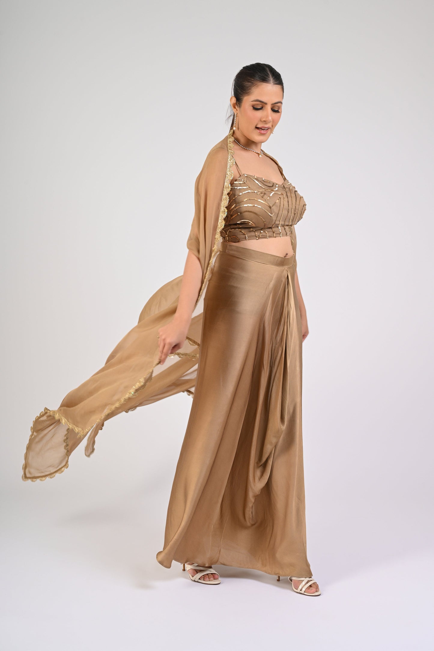 Dull Gold Satin-Silk Draped Skirt Set with Sequined Blouse & Organza Cape – Luxury Wedding Wear