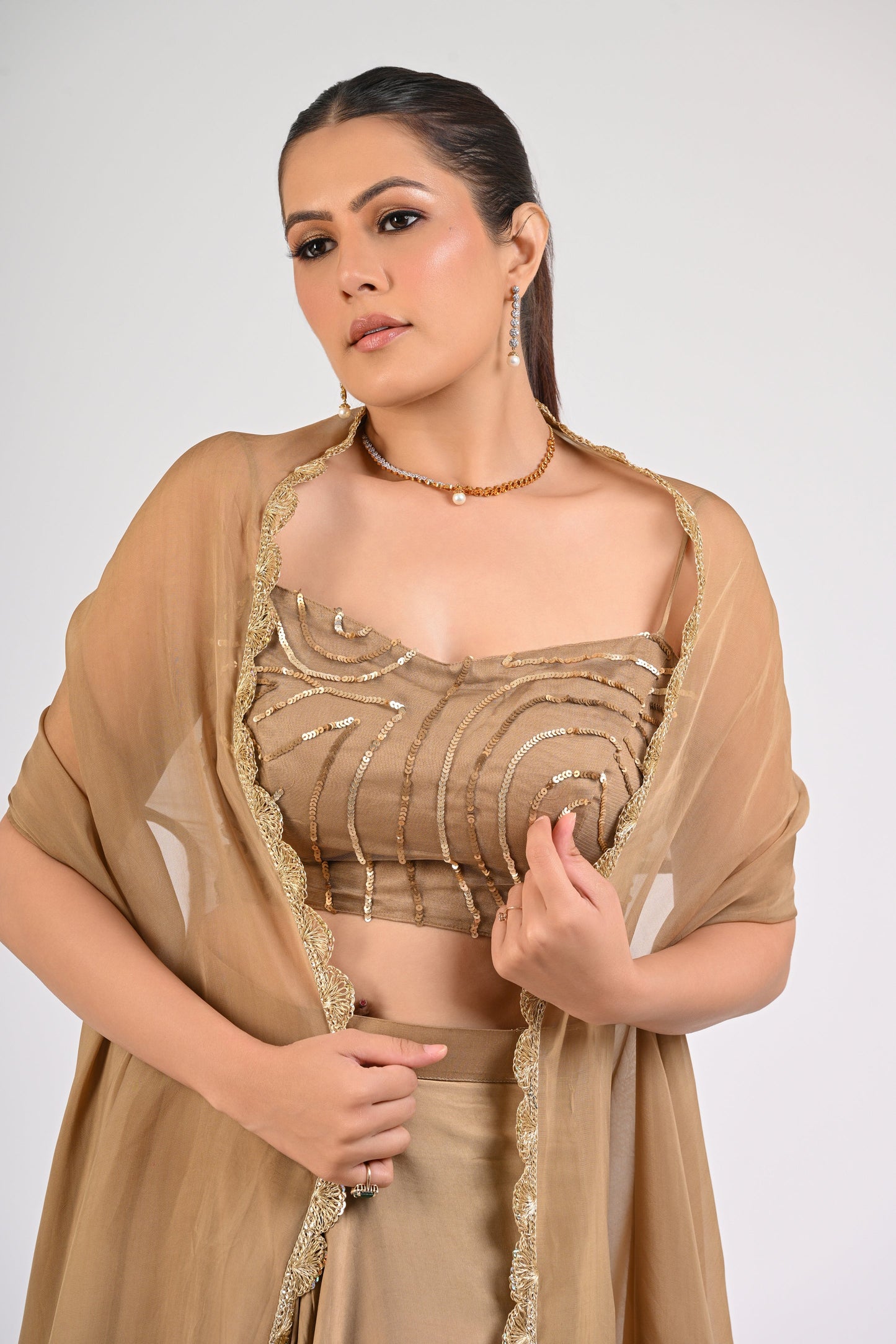 Dull Gold Satin-Silk Draped Skirt Set with Sequined Blouse & Organza Cape – Luxury Wedding Wear