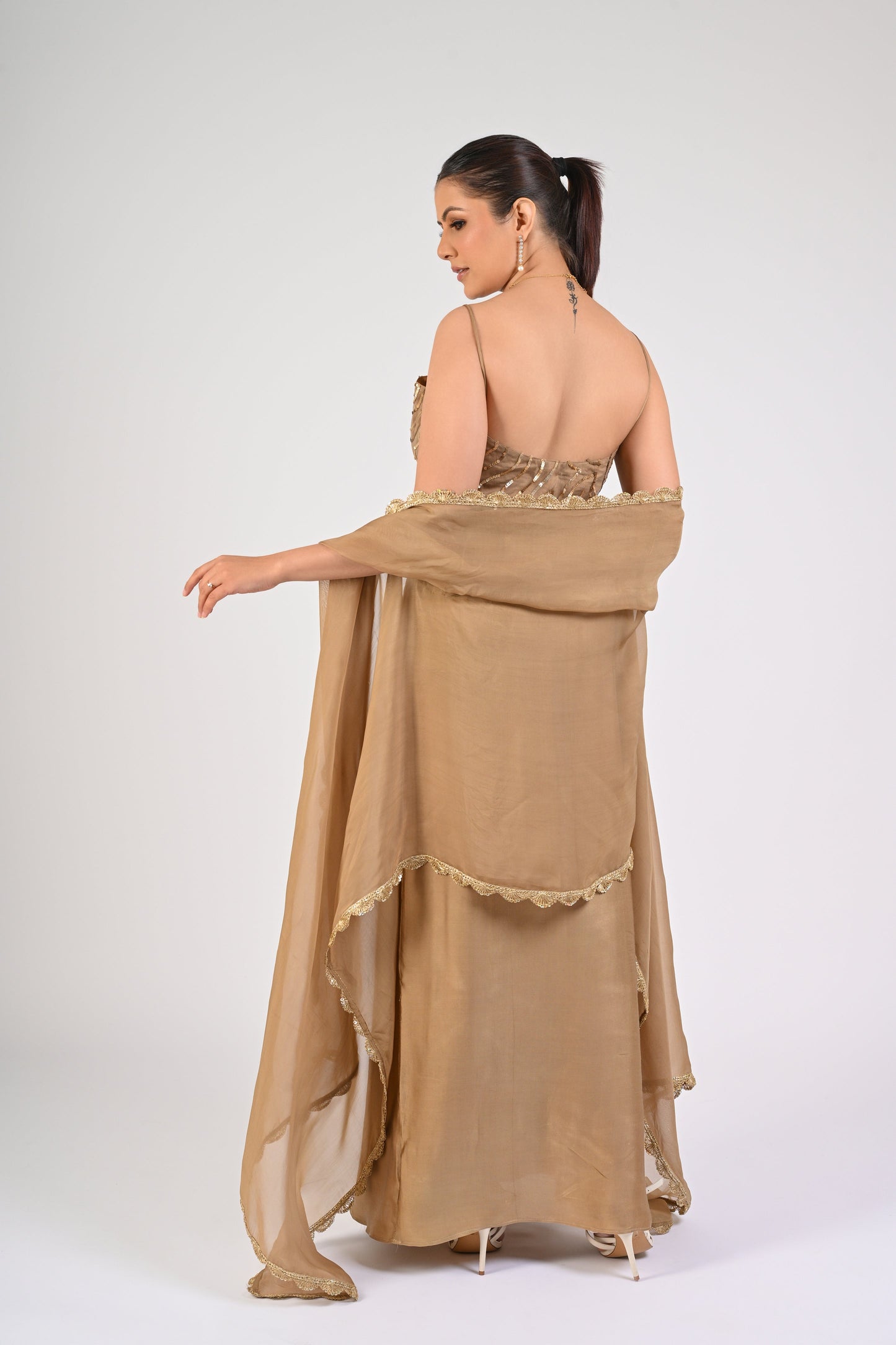 Dull Gold Satin-Silk Draped Skirt Set with Sequined Blouse & Organza Cape – Luxury Wedding Wear