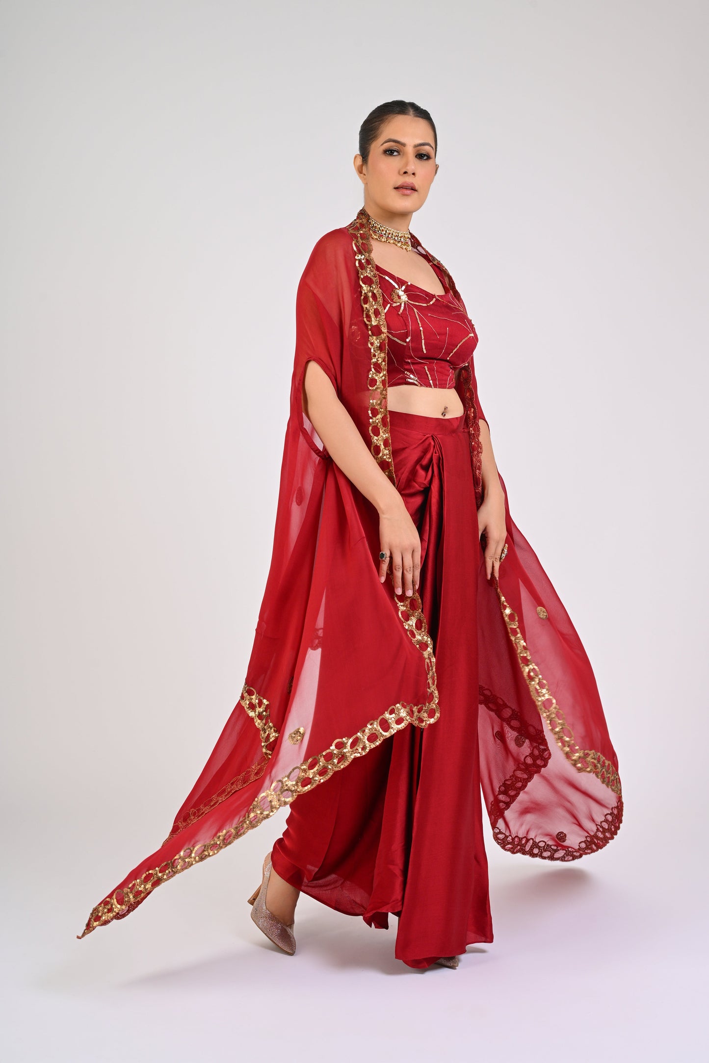 Opulent Syrah Red Satin Skirt Ensemble with Intricate Bustier and Flowing Organza Cape